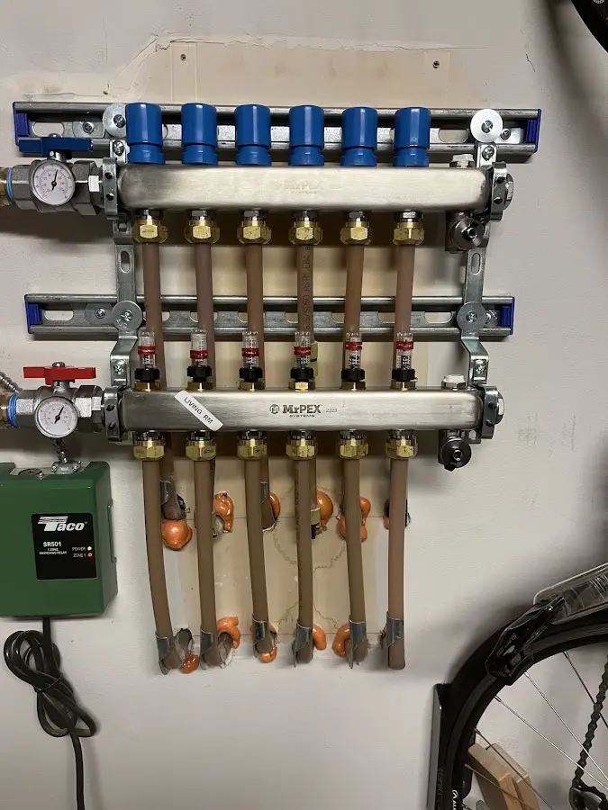 Plumber performing Leak Detection at a residential property in Kingstowne